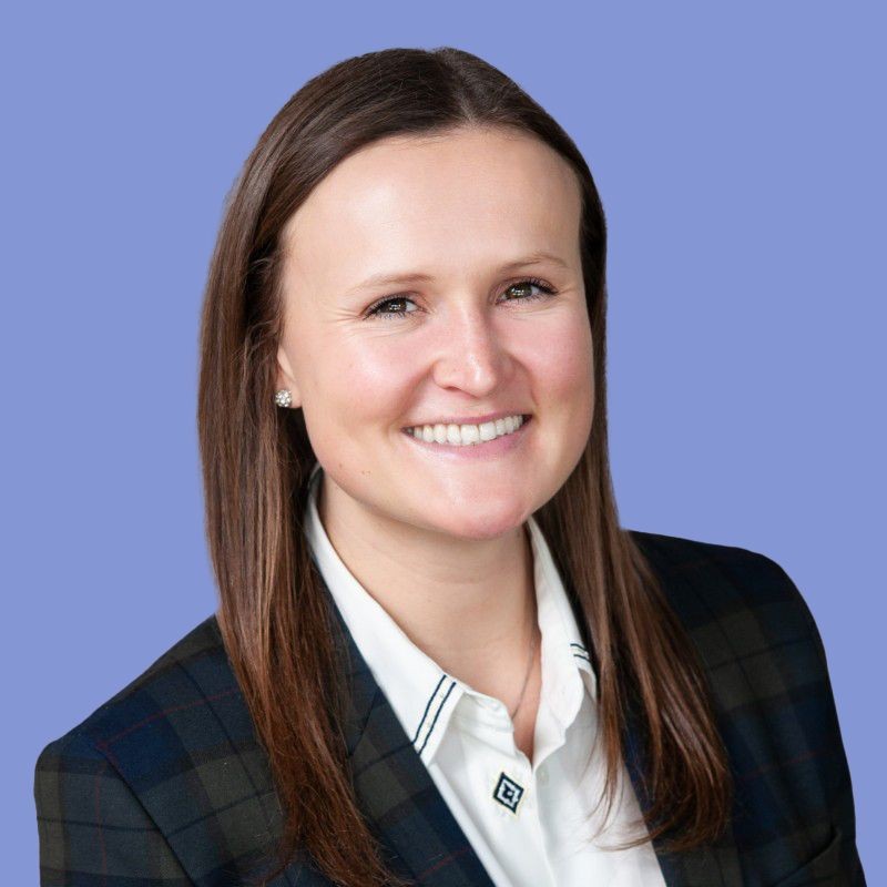 headshot of Megan Greiner on a light purple background